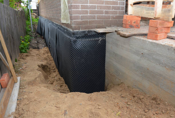 Happy homeowners after waterproofing job in Memphis